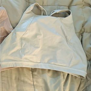 White sold. Pink available. Free to be serene. Lululemon sports bra. Size 12